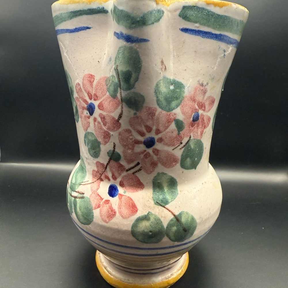 Vintage hand crafted Italian pottery pitcher with floral design